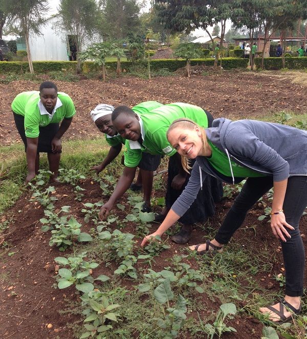 Weeding in the garden with DIG facilitators