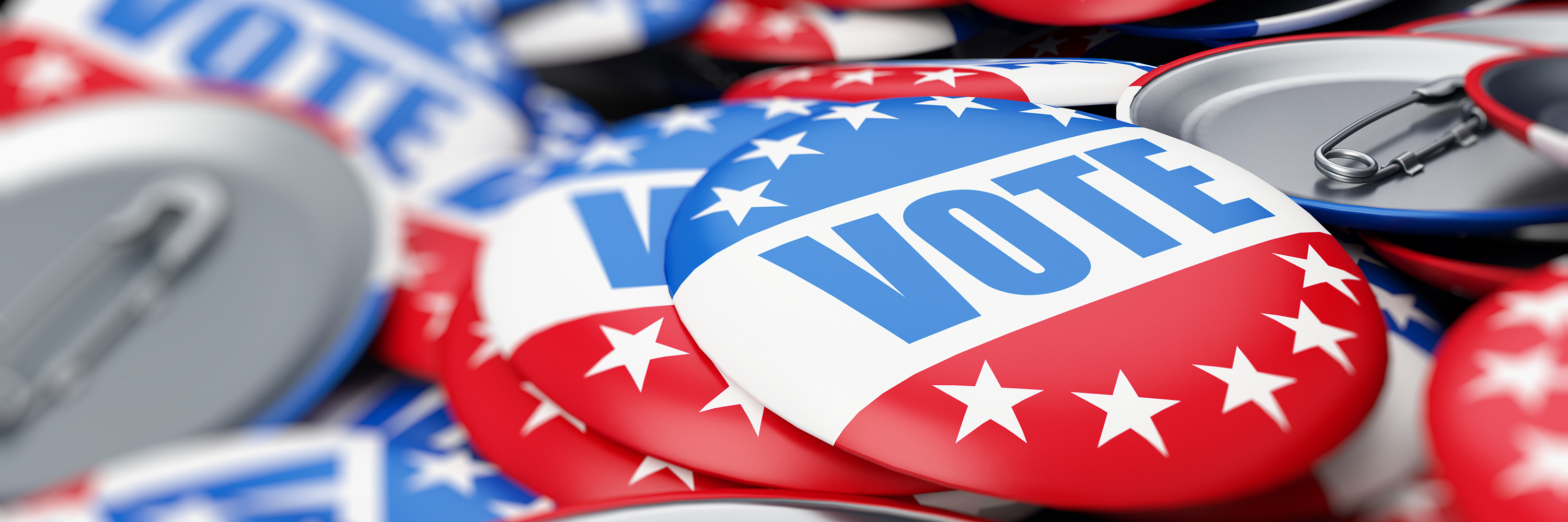 a pile of buttons that say 