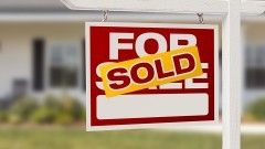 For sale sign with a 